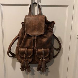 Faux Leather Backpack with adjustable straps.